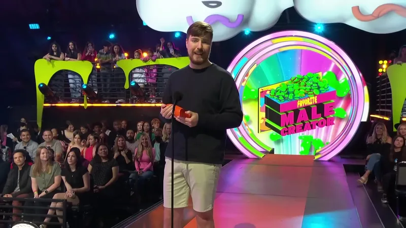 MrBeast on stage at an awards show in front of a live audience